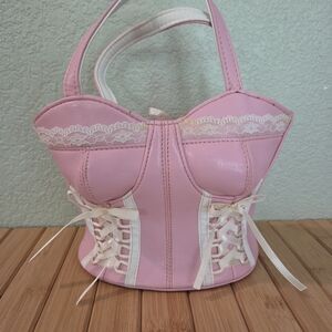 Pink Corset-Style Handbag with Lace Details